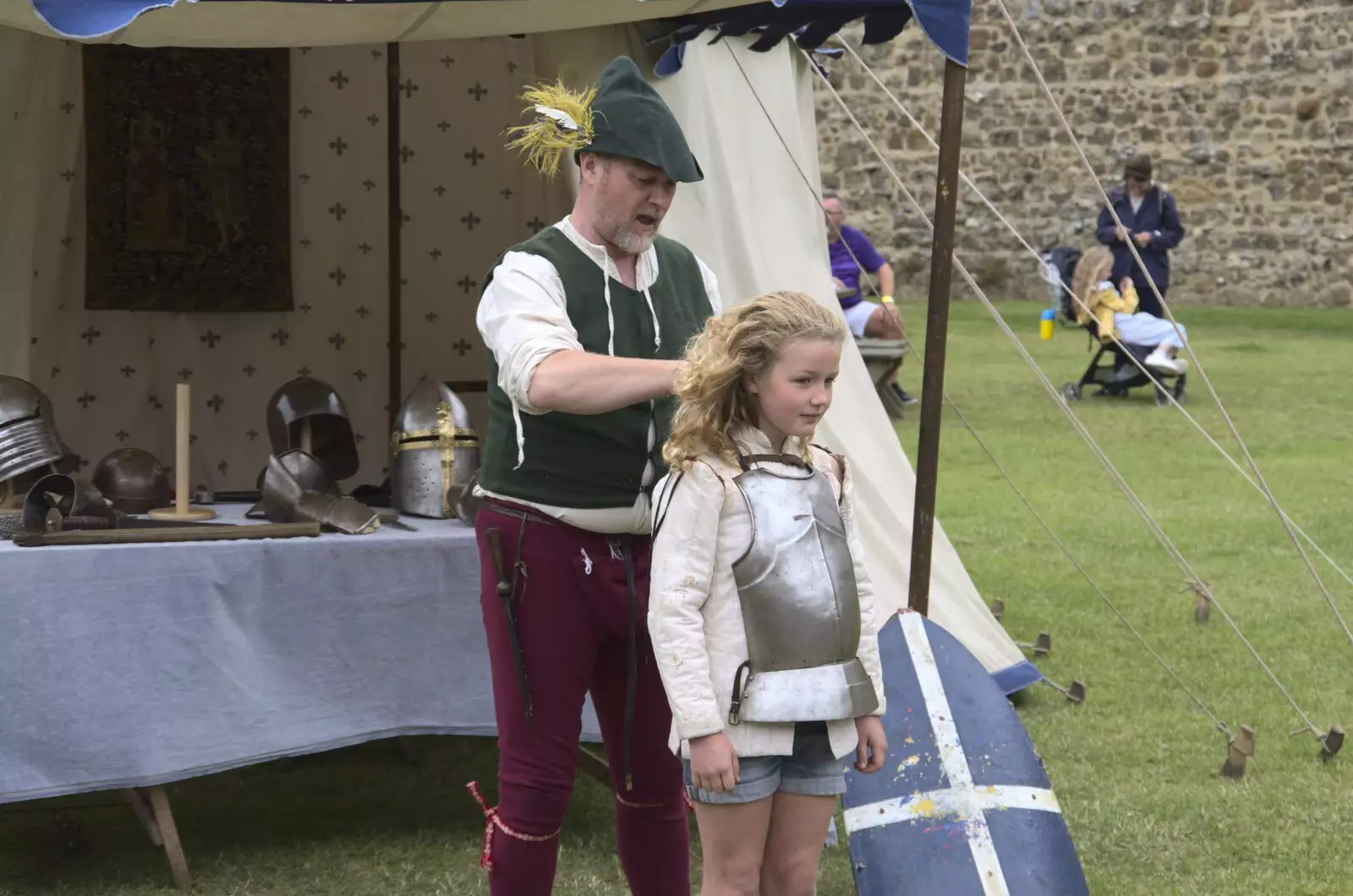 A girl gets dressed up in armour, from The Irish Massive do Framlingham and Southwold, Suffolk - 9th August 2023