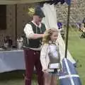 A girl gets dressed up in armour, The Irish Massive do Framlingham and Southwold, Suffolk - 9th August 2023