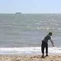 Harry flings some stones into the sea, A trip on the Ferris Wheel, Felixstowe, Suffolk - 15th August 2023