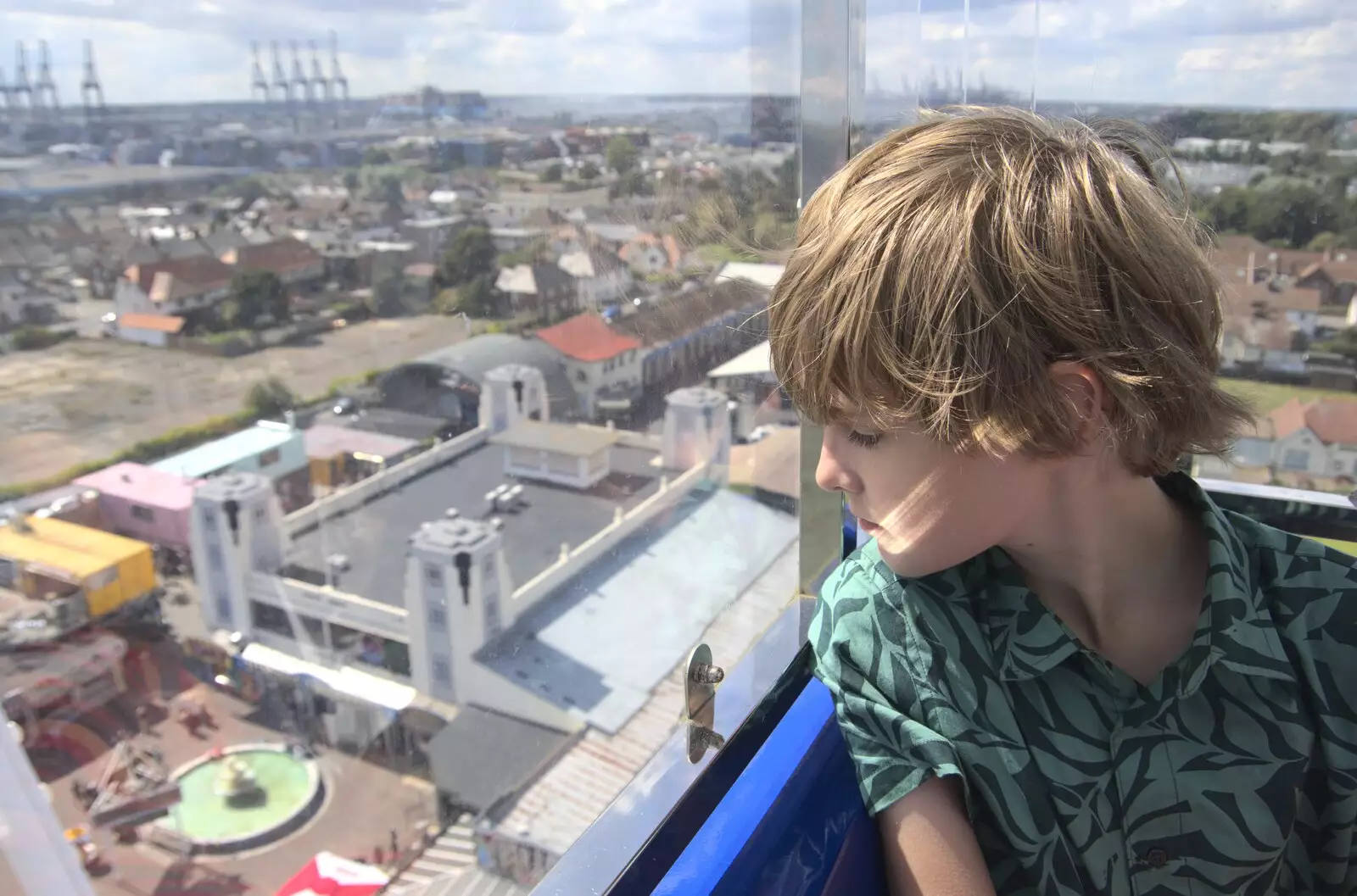 Harry looks down nervously, from A trip on the Ferris Wheel, Felixstowe, Suffolk - 15th August 2023