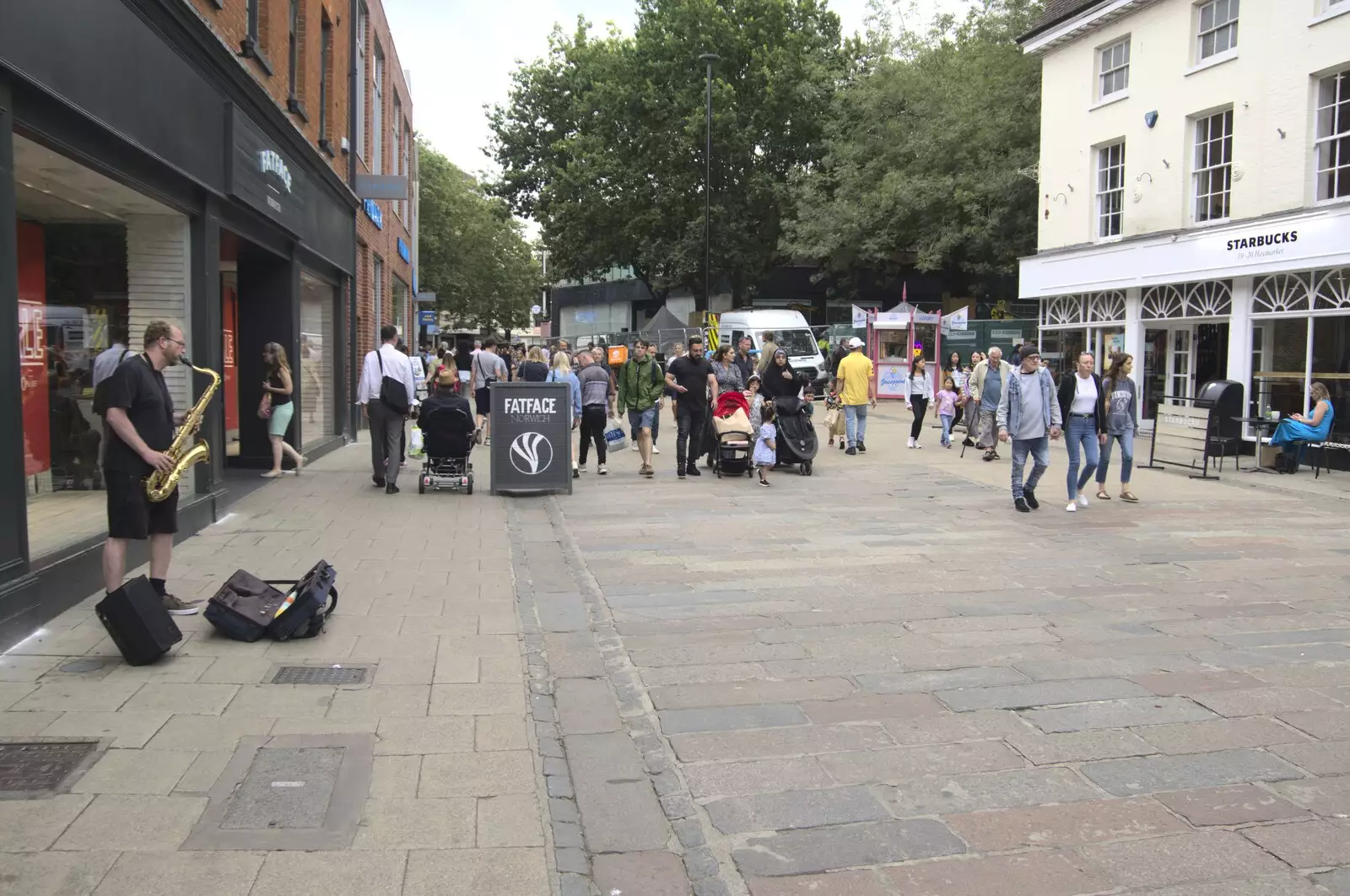 There's a busking saxophone on Gentleman's Walk, from Shoe Shopping in Norwich, Norfolk - 16th August 2023