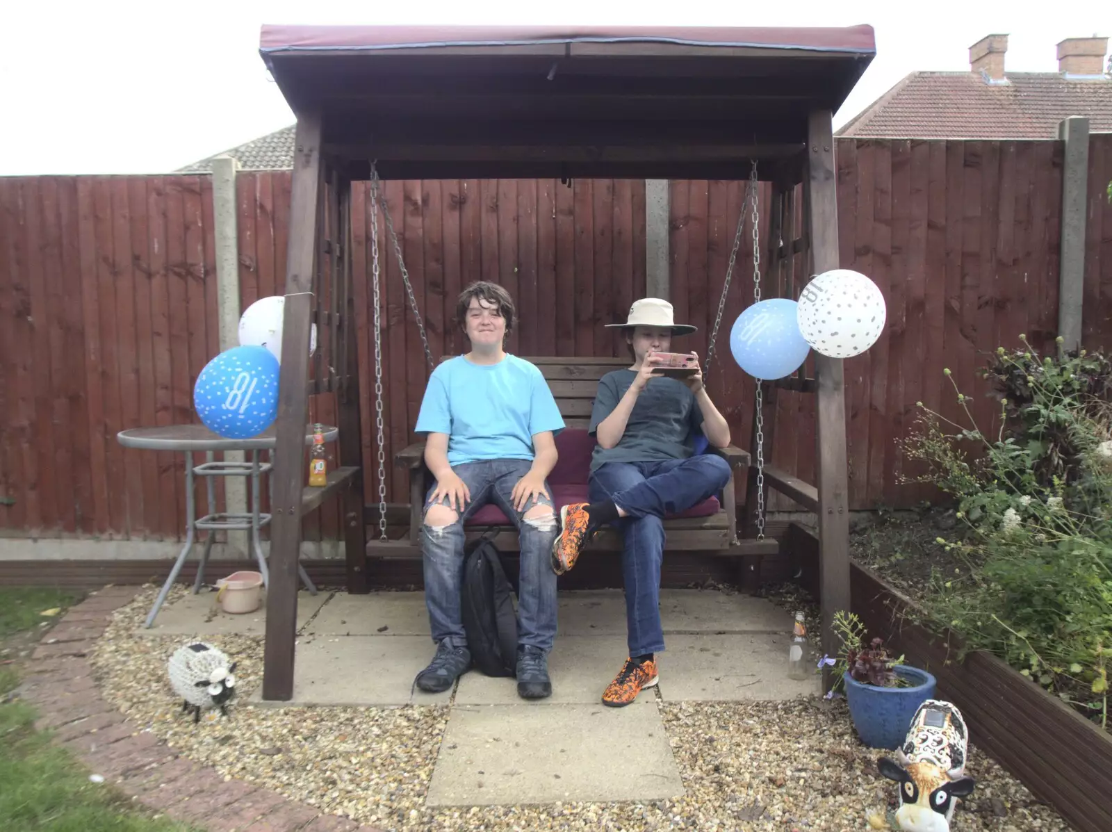 Fred and Oak hang out on a swing seat, from Sean Visits, and an 18th Birthday Party, Eye, Suffolk - 18th August 2023