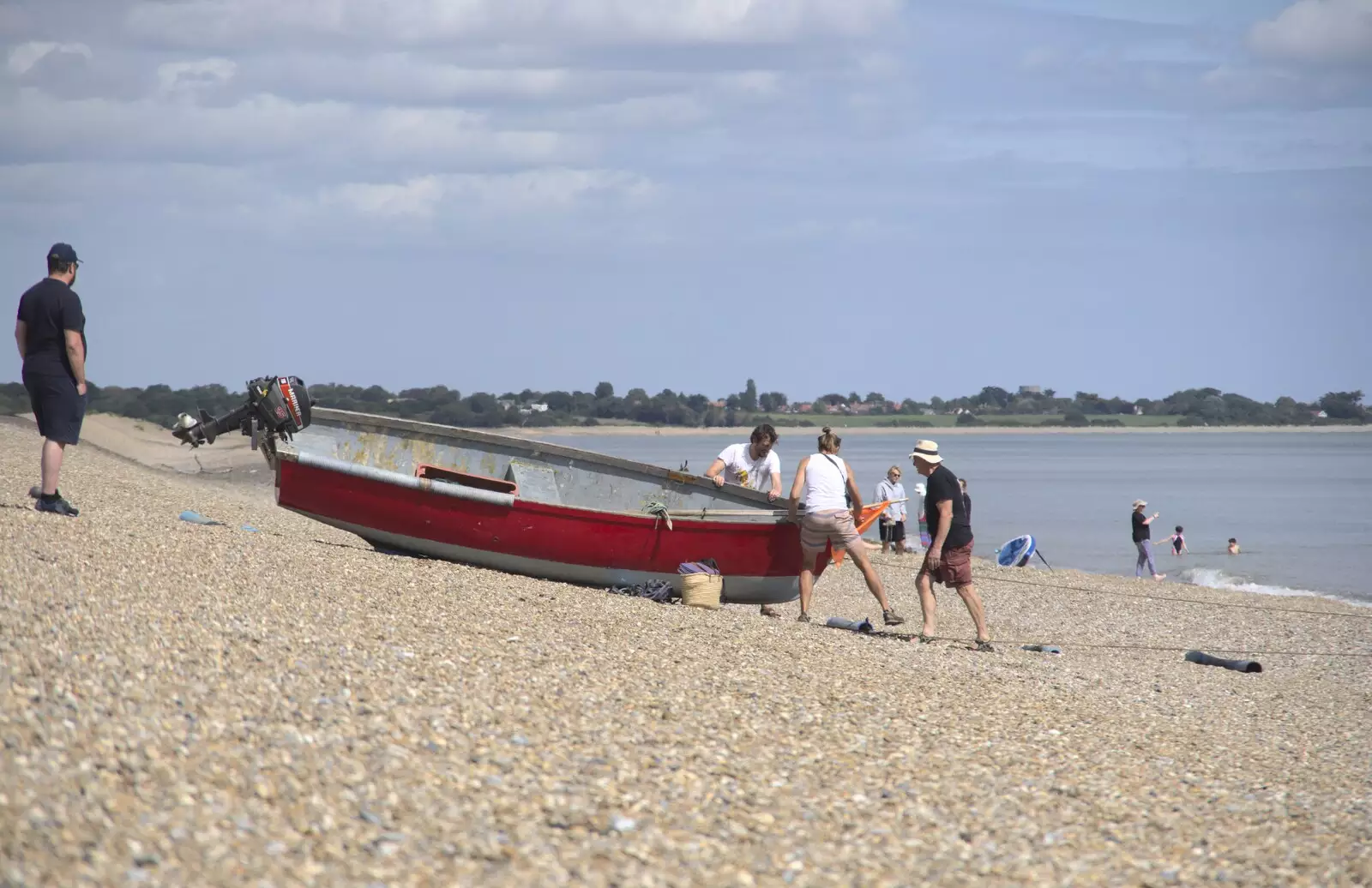 A small boat is put out to sea, from A Cambridge Reunion on the Beach, Dunwich, Suffolk - 23rd August 2023