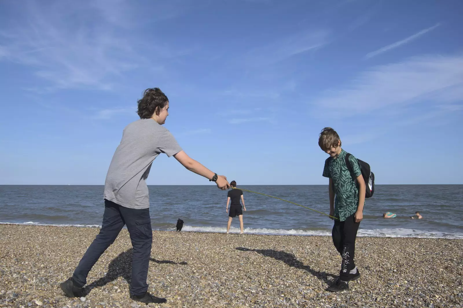 Fred pokes Harry with his new-found tape measure, from A Cambridge Reunion on the Beach, Dunwich, Suffolk - 23rd August 2023