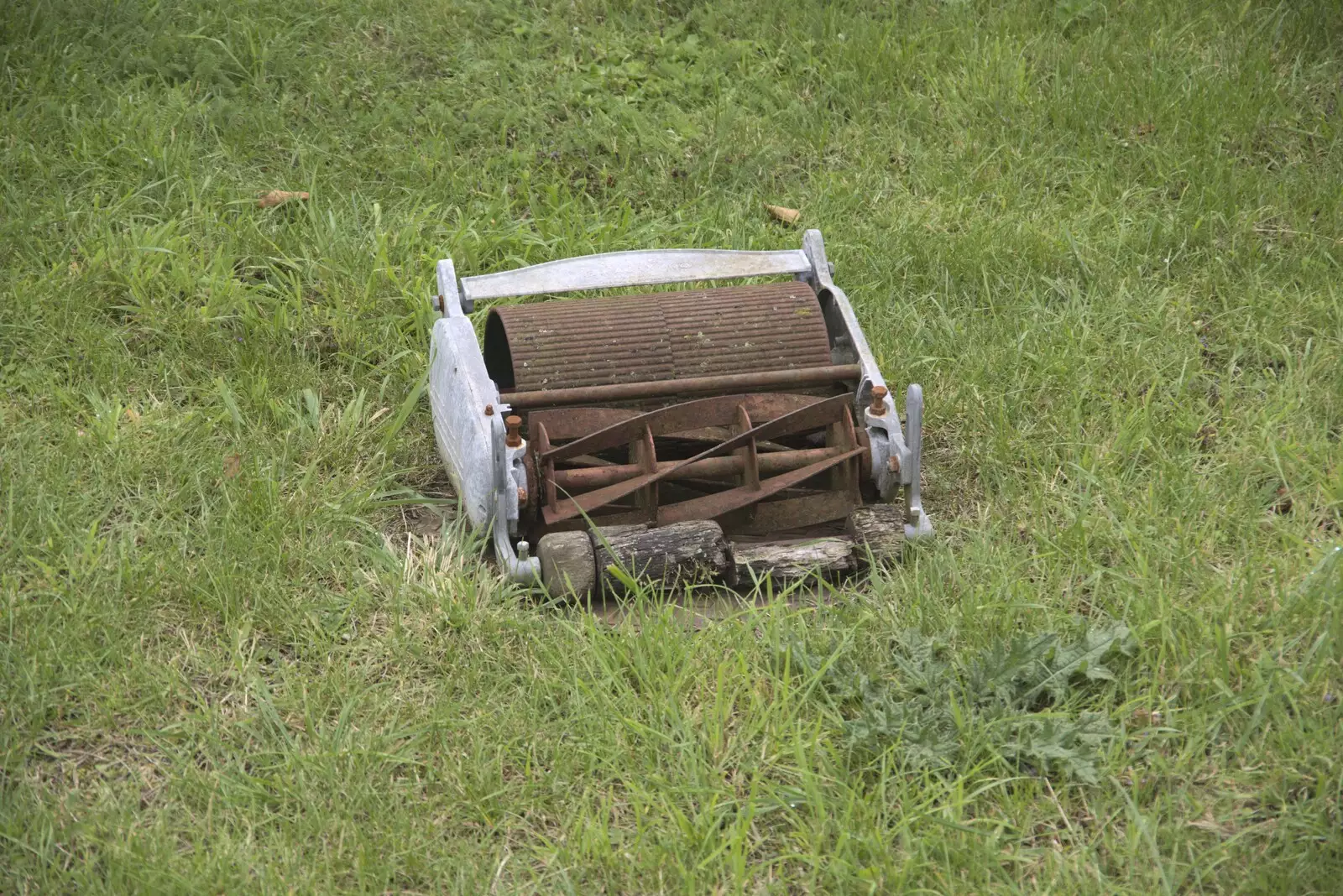 Part of an old lawnmower sits in a lawn, from The BSCC at the Cock Inn and a Flute Exam, Bedfield, Suffolk - 25th August 2023