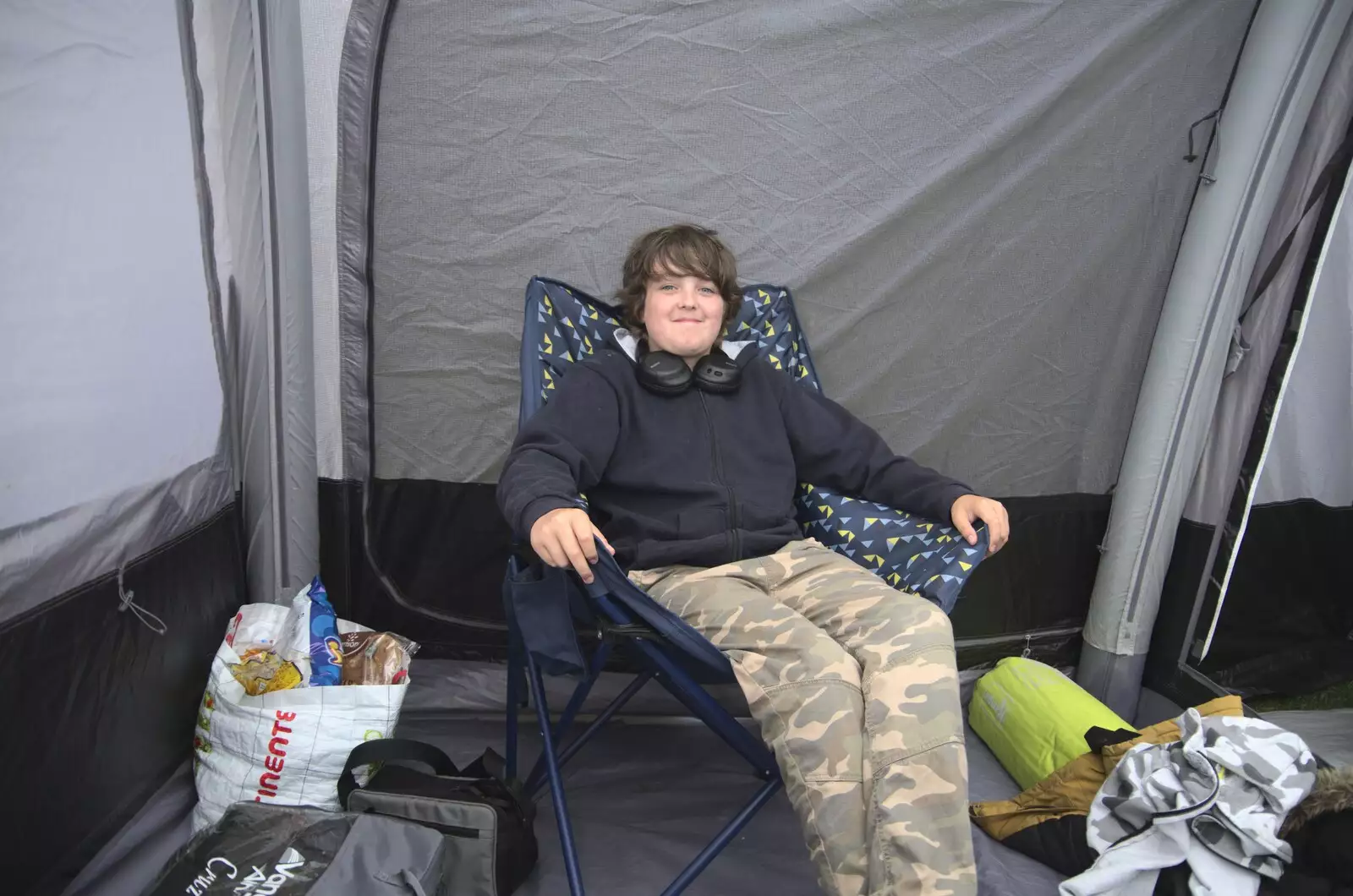 Fred sits around in the awning, from Camping on the Edge at Snettisham Beach, Norfolk - 28th August 2023
