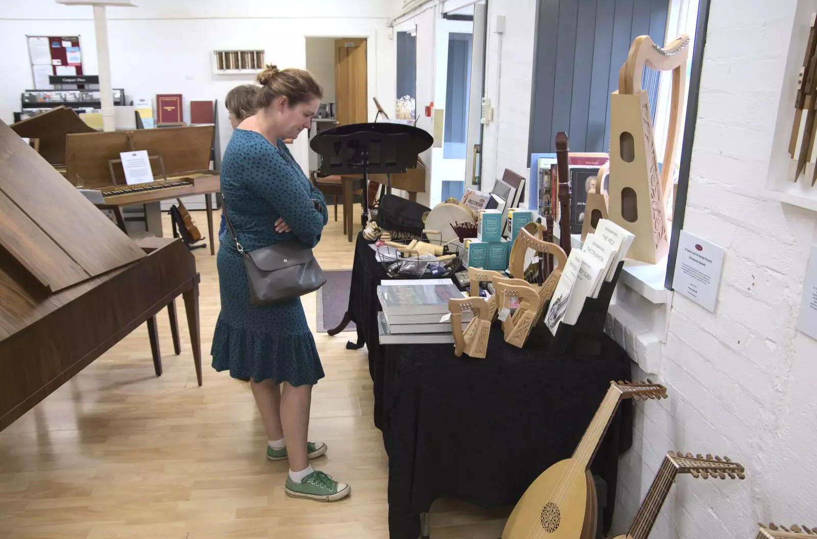 Isobel looks around in the Early Music Shop, from Fred and the SYWO at Snape Maltings, Snape, Suffolk - 3rd September 2023