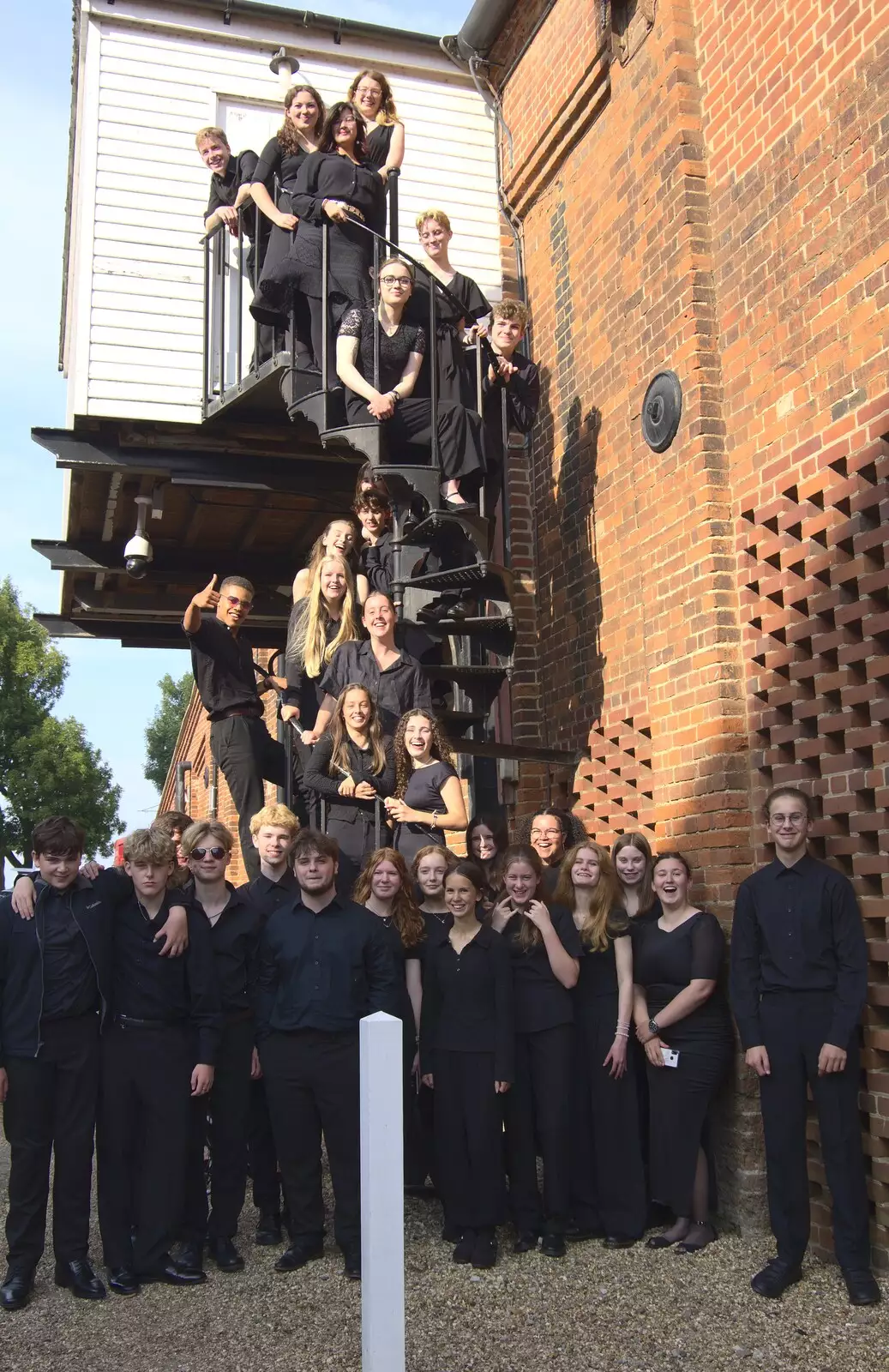 The Wind Orchestra does a photo on the fire escape, from Fred and the SYWO at Snape Maltings, Snape, Suffolk - 3rd September 2023