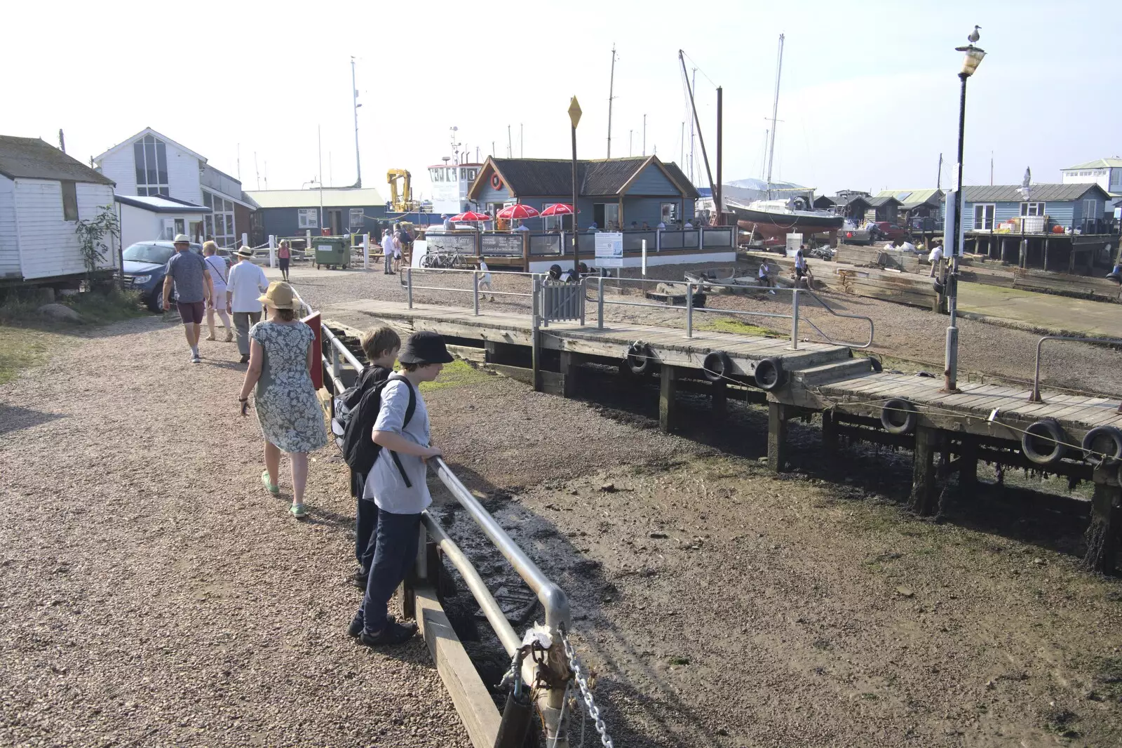 Harry and Fred look over the ferry pontoon, from A Postcard From Felixstowe Ferry, Suffolk - 10th September 2023