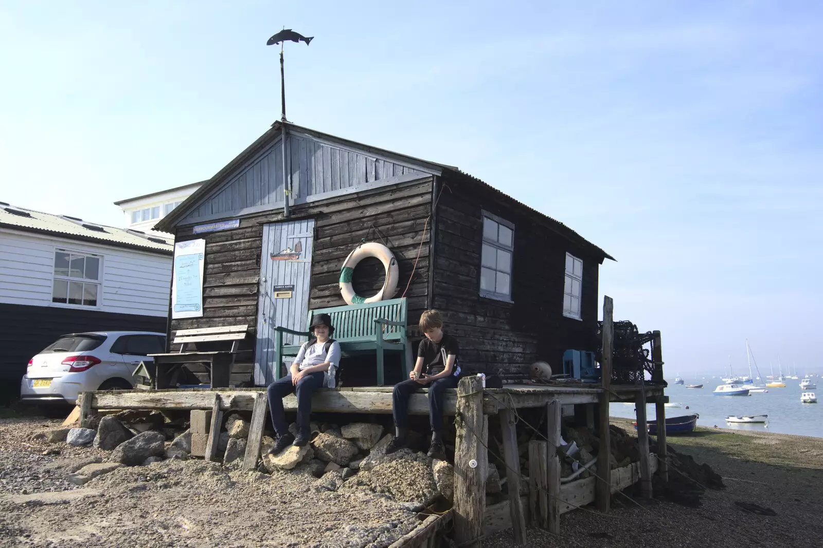 The boys sit by the crooked shed, from A Postcard From Felixstowe Ferry, Suffolk - 10th September 2023