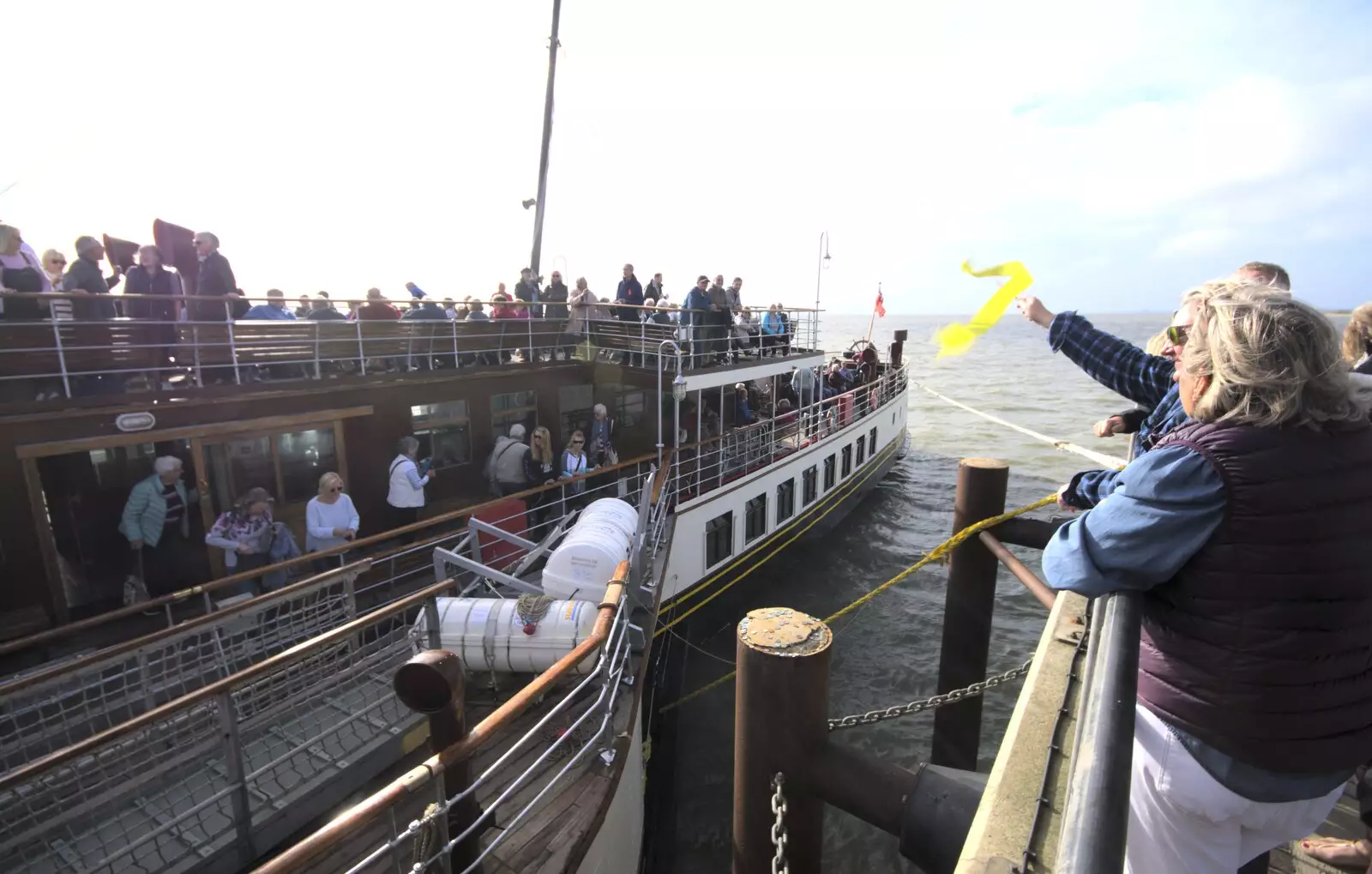 Someone waves a yellow streamer, from The Waverley Paddle Steamer at Southwold Pier, Suffolk - 27th September 2023