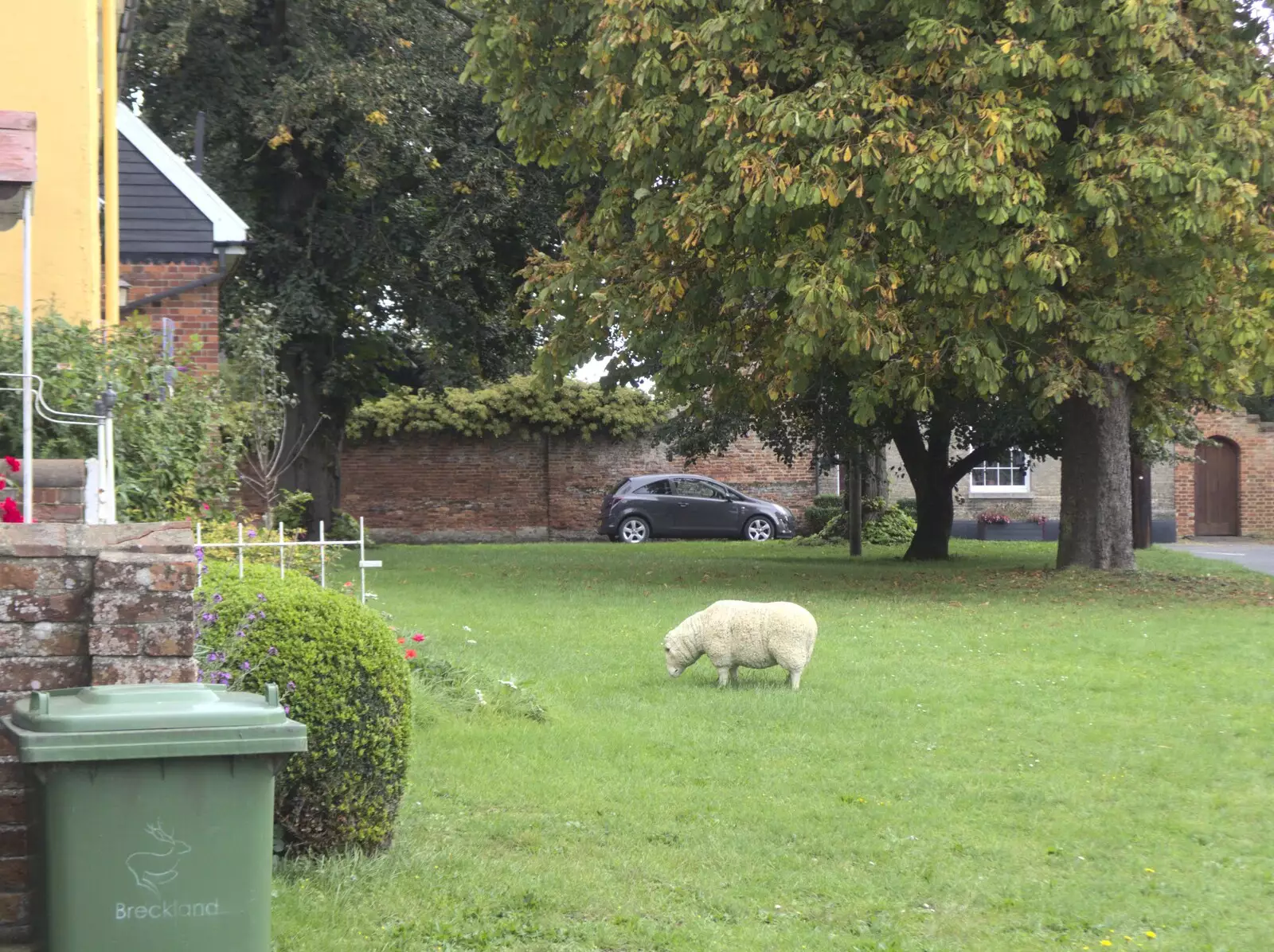 There's a sheep statue endlessly grazing, from A Postcard From New Buckenham, Norfolk - 5th October 2023