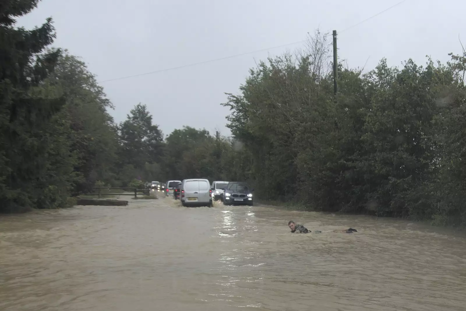 There's a dude swimming in the A143 at Wattisfield, from Tales From The Floods, Bury St. Edmunds and Walsham Le Willows, Suffolk - 20th October 2023