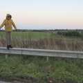 Harry perches on a crash barrier, A Giant Load on the A140, Yaxley, Suffolk - 22nd October 2023