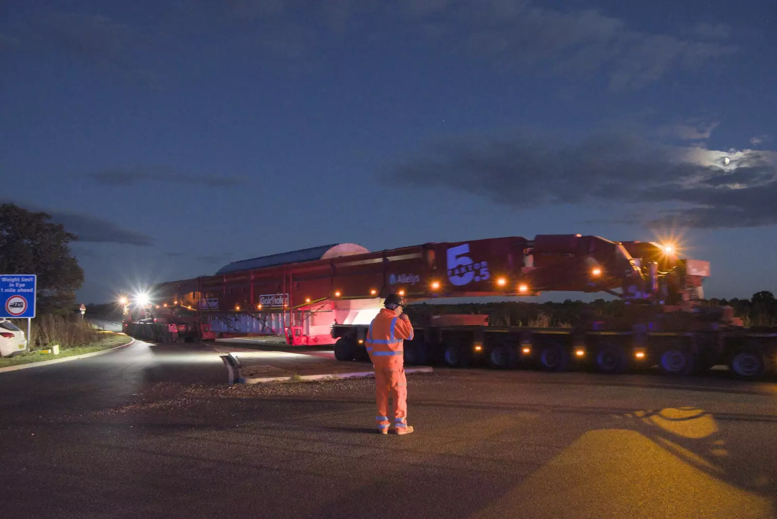 The long load moves off the roundabout, from A Giant Load on the A140, Yaxley, Suffolk - 22nd October 2023