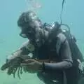 A diver floats by with a lobster, The Cats of Rhodes, Ρόδος, Greece - 24th October 2023