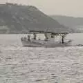 A fishing boat heads back to Mandraki Harbour, The Cats of Rhodes, Ρόδος, Greece - 24th October 2023