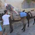 A tourist struggles onto a donkey, A Trip to Lindos and More Cats of Rhodes, Ρόδος και Λίνδος, Greece - 28th October 2023