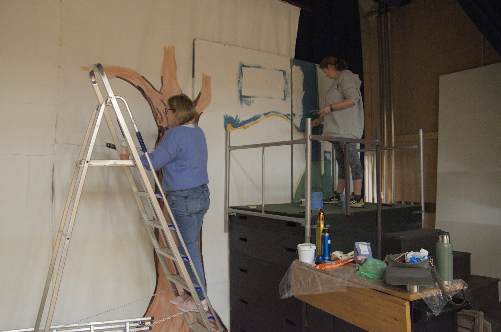 Isobel starts on painting a bedroom scene from Painting the Set at the Village Hall, Garboldisham, Norfolk - 8th November 2023