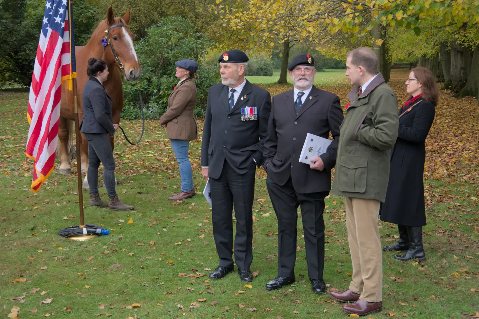 More ex-military dudes by the memorial, from A B-17 Memorial, The Oaksmere Hotel, Brome, Suffolk - 10th November 2023