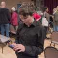Fred checks his phone after the gig, The Baker's Wife, Garboldisham Village Hall, Norfolk - 18th November 2023