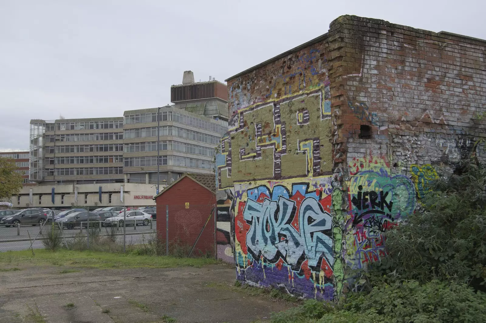 A crumbling wall, and the crumbling HMSO building, from The Graffiti of HMSO and Anglia Square, Coslany, Norwich - 22nd November 2023