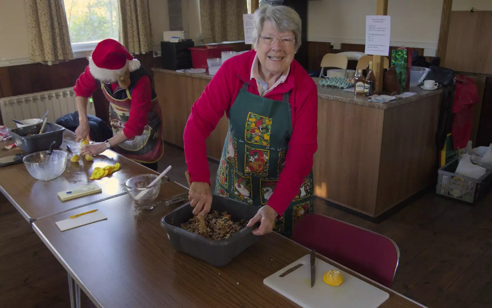 The ladies of the village are mixing, from The GSB and the Christmas Pudding Mixing, Wickham Skeith, Suffolk - 25th November 2023