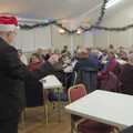 Andy conducts the audience in a verse of a carol, Christmas Music with the GSB, Gislingham, Suffolk - 15th December 2023