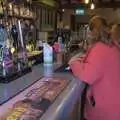 Isobel waits to get served at the bar, Christmas and Boxing Day, Brome, Suffolk - 25th December 2023