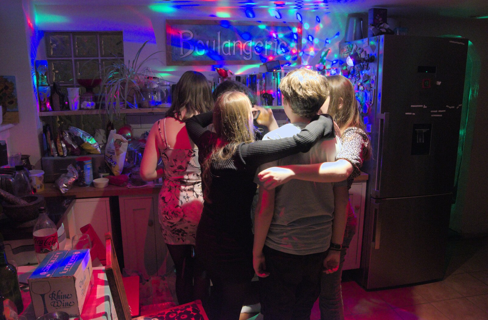 More group hugs in the kitchen from New Year's Eve and a 50th Park Run, Thornham, Suffolk - 31st December 2023