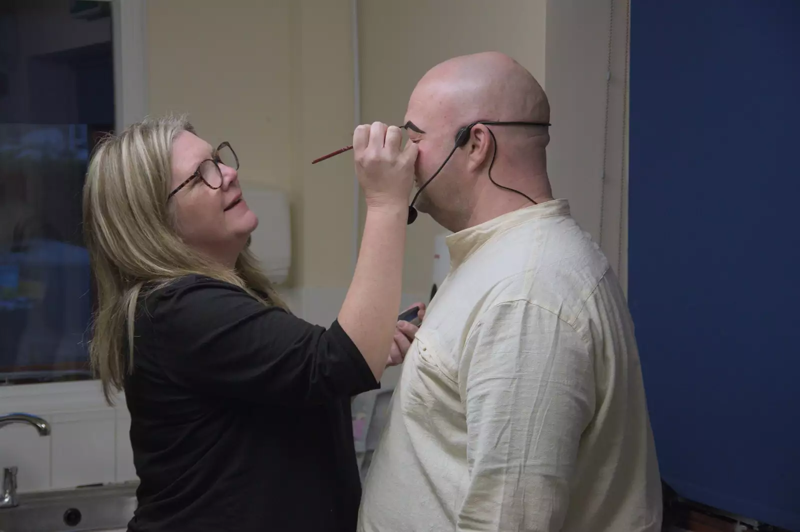 Nicola paints evil eyebrows on Will, from Norwich Sushi and Pantomime Rehearsals, Occold, Suffolk - 7th January 2024