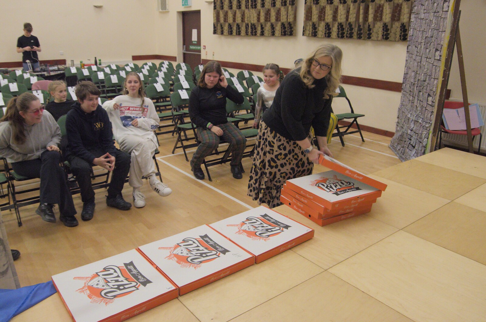Helen dishes out the pizzas from The Dove Players do Puss in Boots, Occold, Suffolk - 13th January 2024
