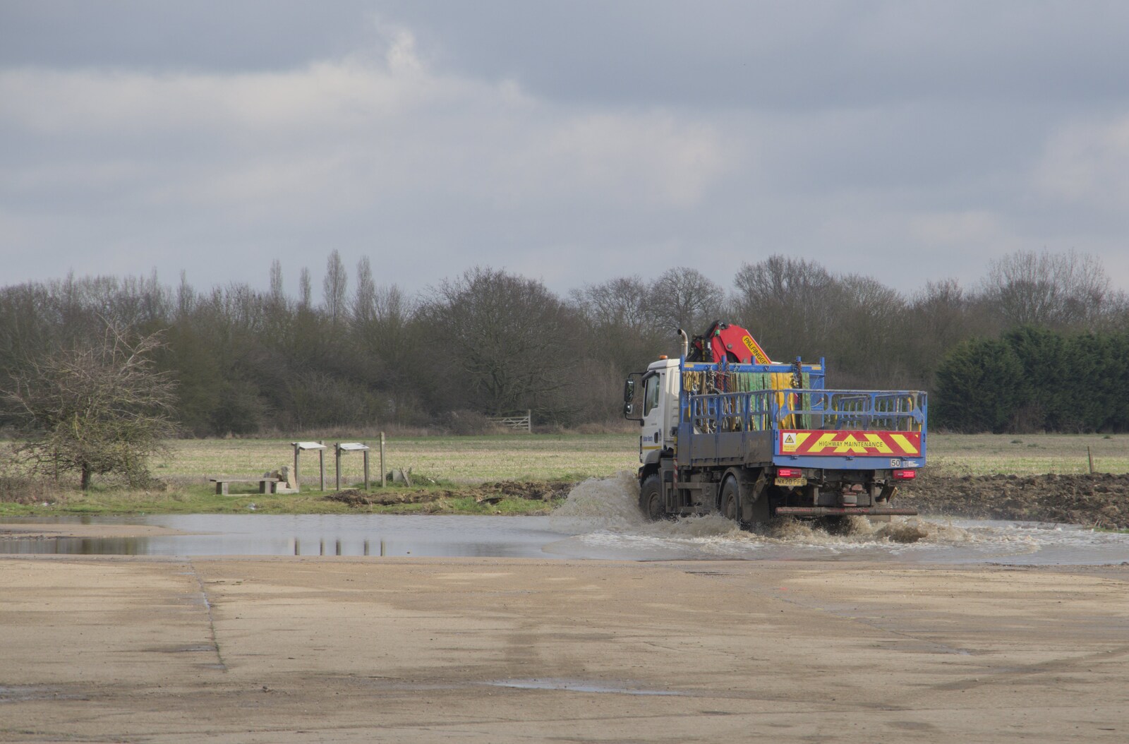 A builder's van piles through floodwater from A Long Walk Around the Airfield, Eye, Suffolk - 11th February 2024