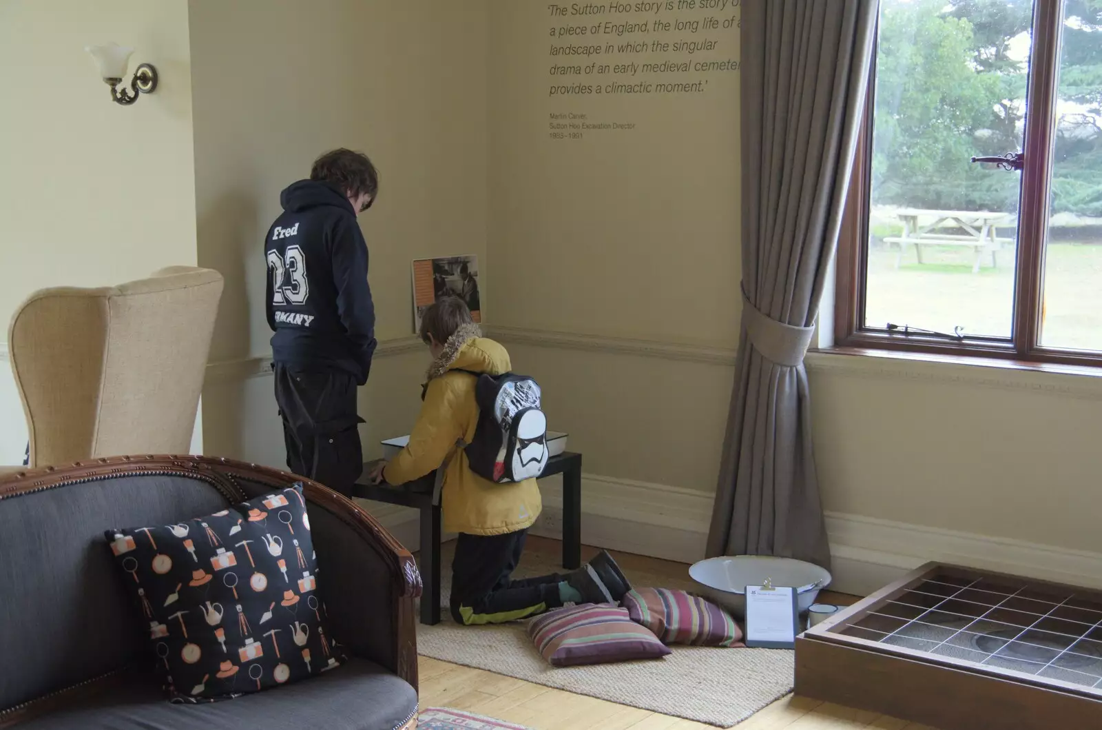 Harry rummages around in a finds tray, from Riddlequest at Sutton Hoo, Woodbridge, Suffolk - 23rd February 2024