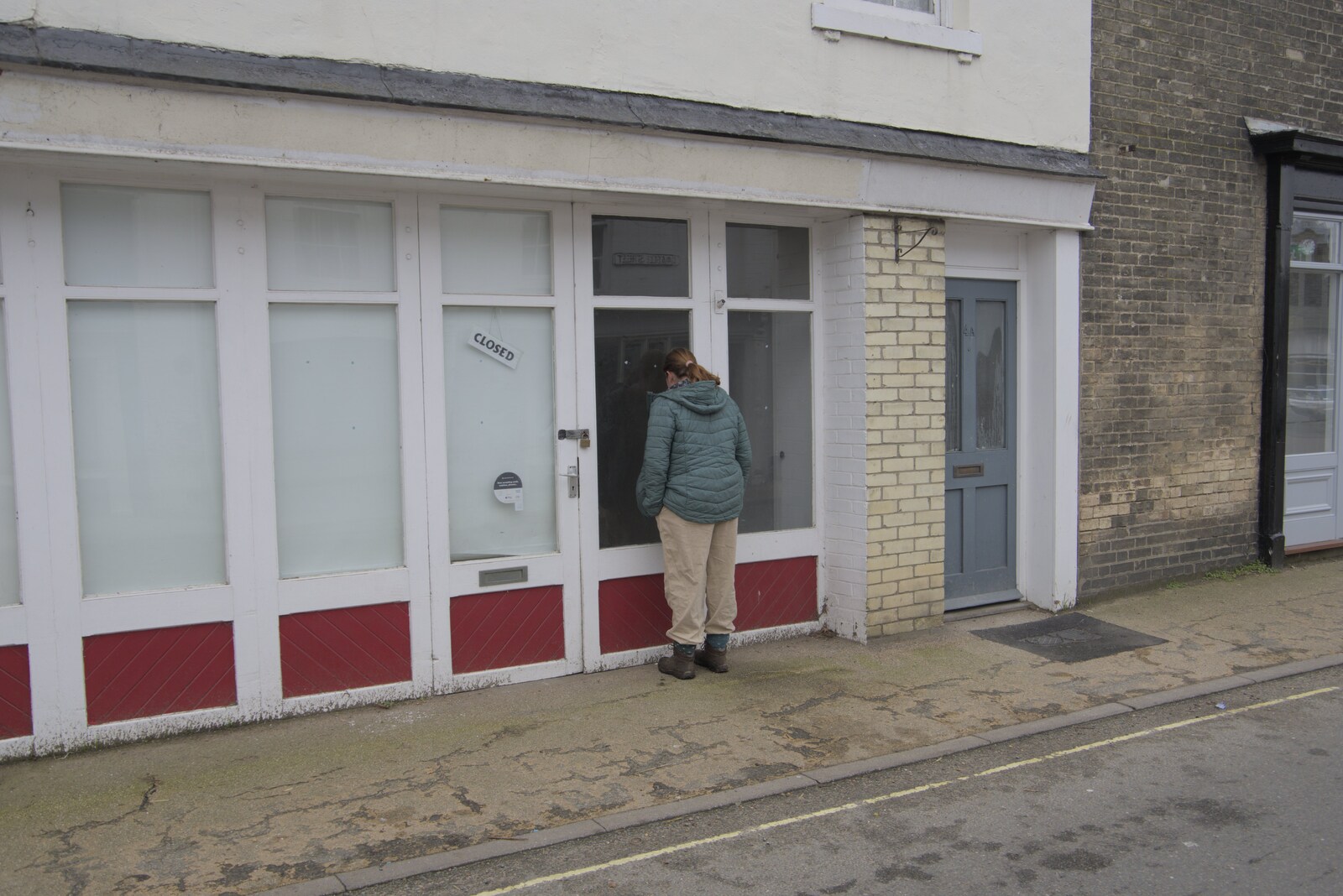 Isobel peers into the old Shurey butchers from Palgrave Player's Wrap Party and a March Miscellany, Suffolk - 6th March 2024
