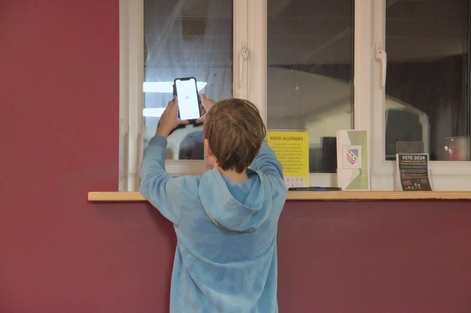 Harry desperately tries to find a signal, from A Cricket Quiz, and a Postcard from Colchester, Essex - 25th March 2024