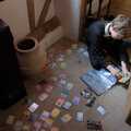 Harry puts some of his Pokémon cards away, A Return to the Walks, Thornham, Suffolk - 1st April 2024