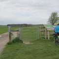 A cyclist stops to check the map, A Postcard from Marlborough and a Walk on the Herepath, Avebury, Wiltshire - 8th April 2024