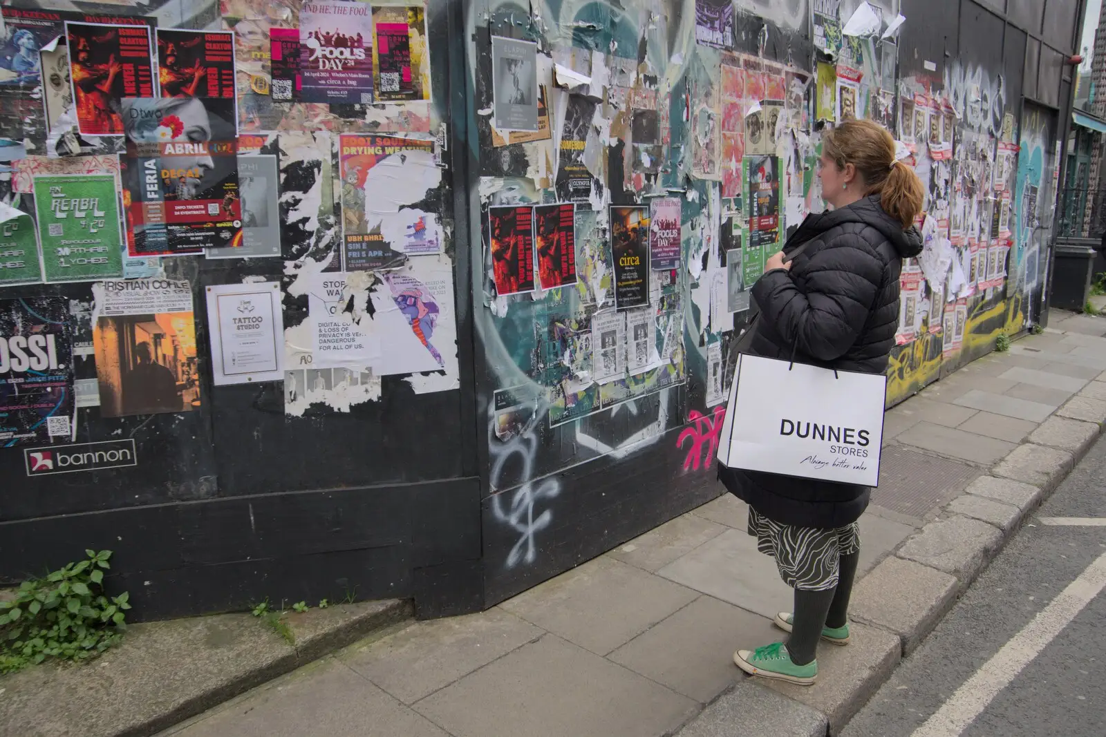 Isobel looks at posters, from A Couple of Days in Dublin, Ireland - 12th April 2024