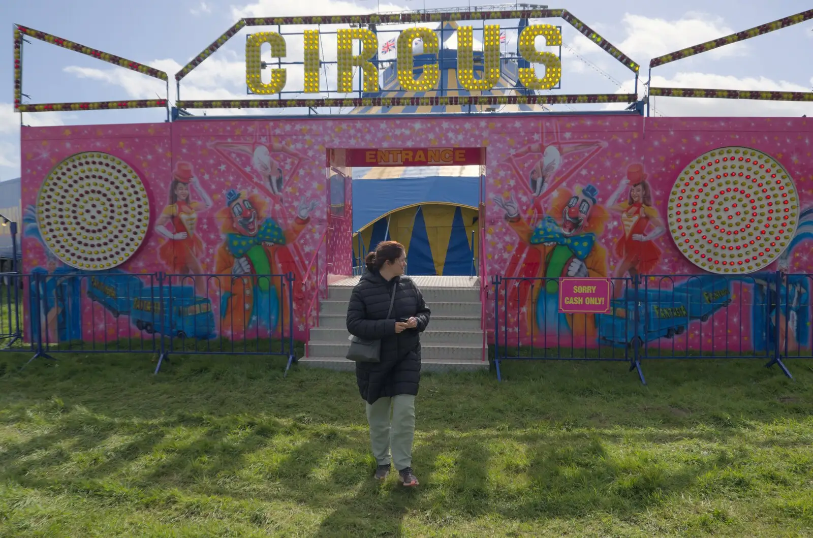 Isobel roams around after her ticket purchase, from A Walk to the Crossways Inn, Scole, Norfolk - 21st April 2024