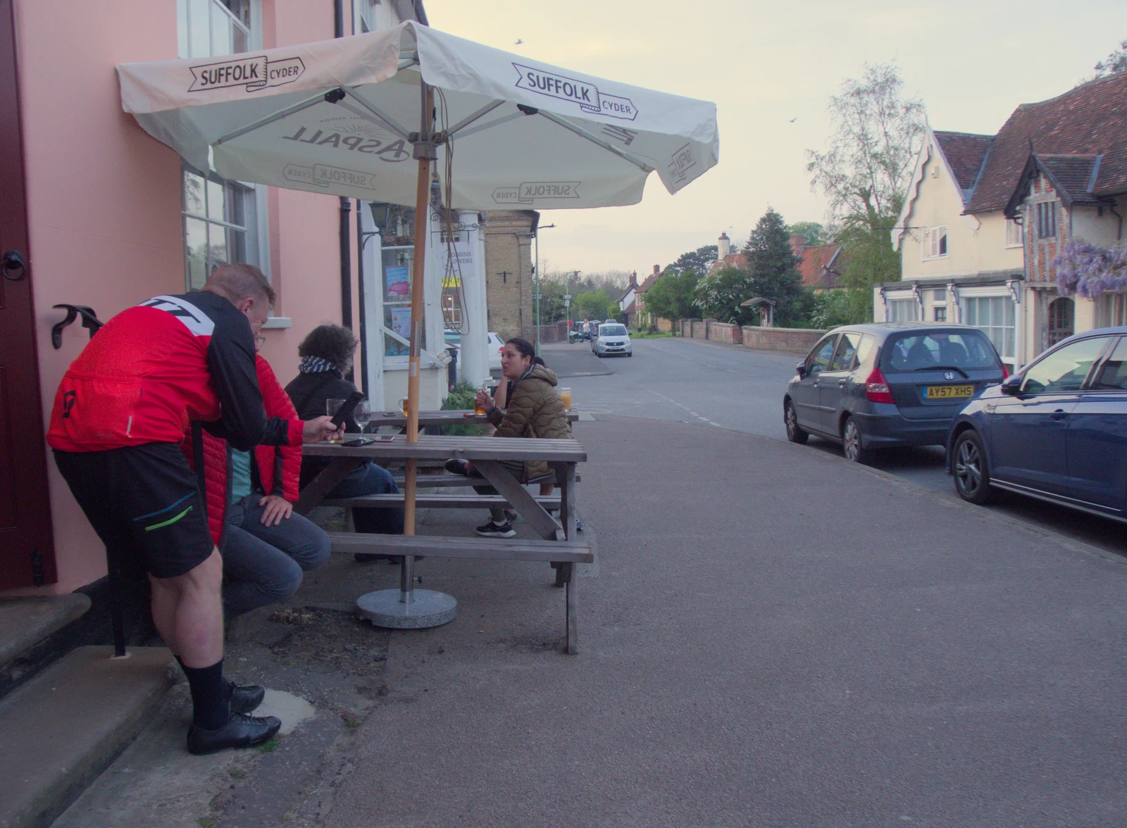 Gaz shows a local something on his phone, from The BSCC at The Lion, Debenham, Suffolk - 2nd May 2024