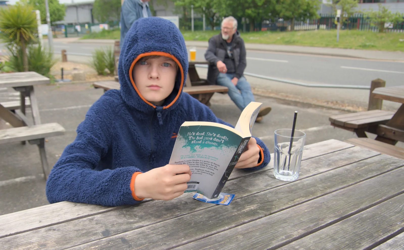 Harry the Hoodie is reading a book, from A May Miscellany and The Harvs at Ampersand, Diss - 9th May 2024