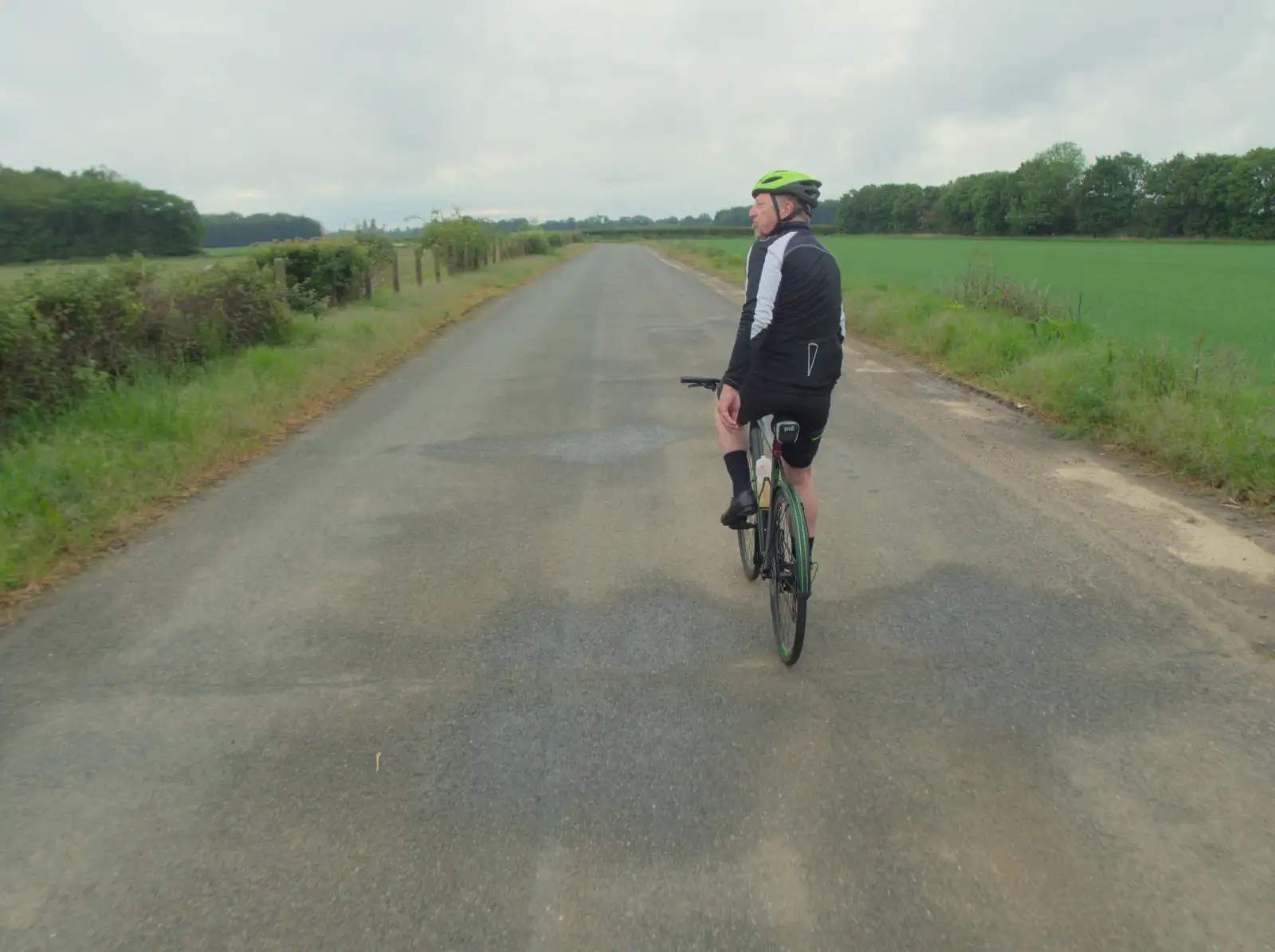 We're on the road through Thorpe Abbots airbase, from The BSCC at The Half Moon, Rushall, Norfolk - 16th May 2024