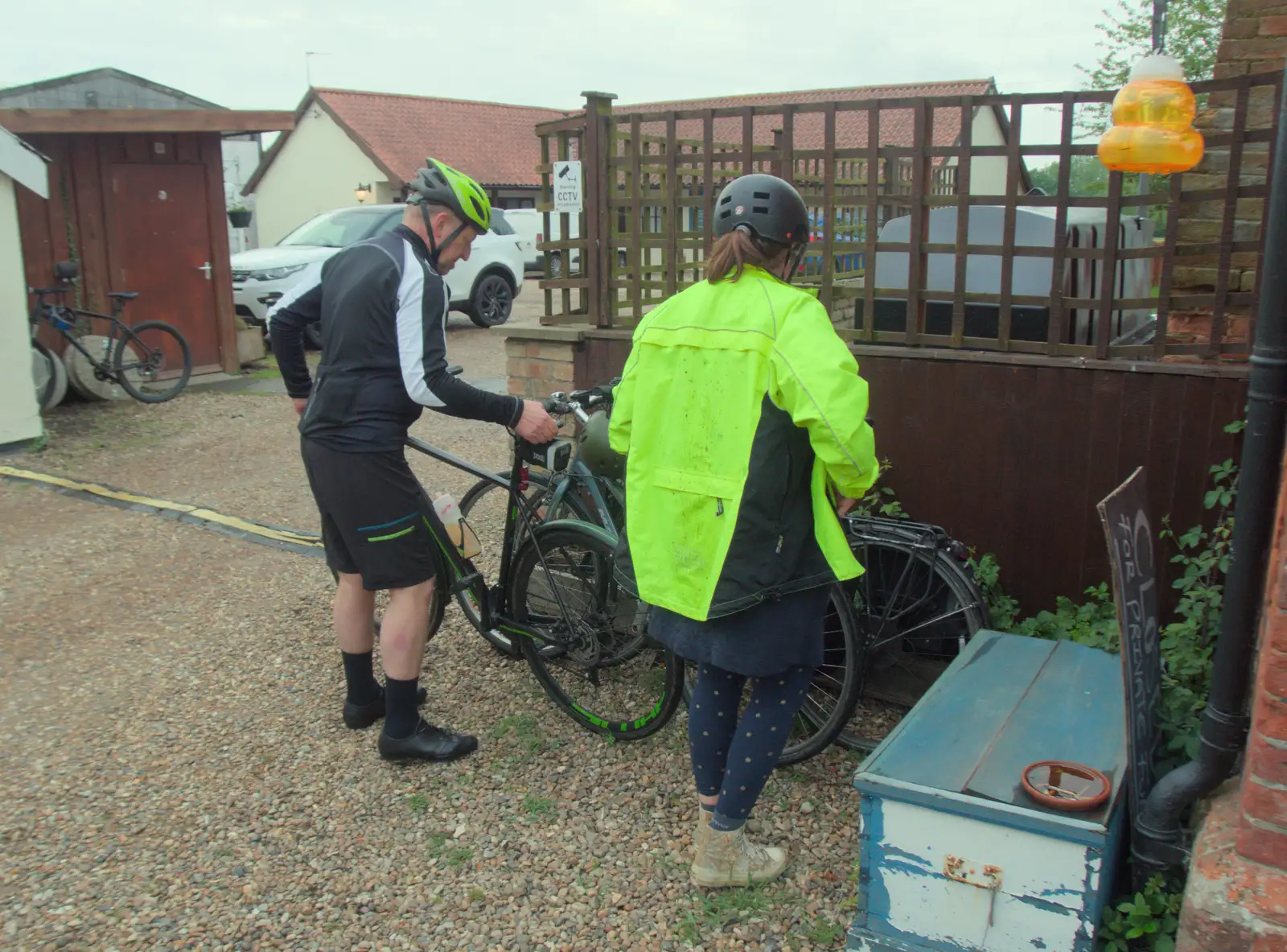 Locking the bikes up at the Half Moon, from The BSCC at The Half Moon, Rushall, Norfolk - 16th May 2024