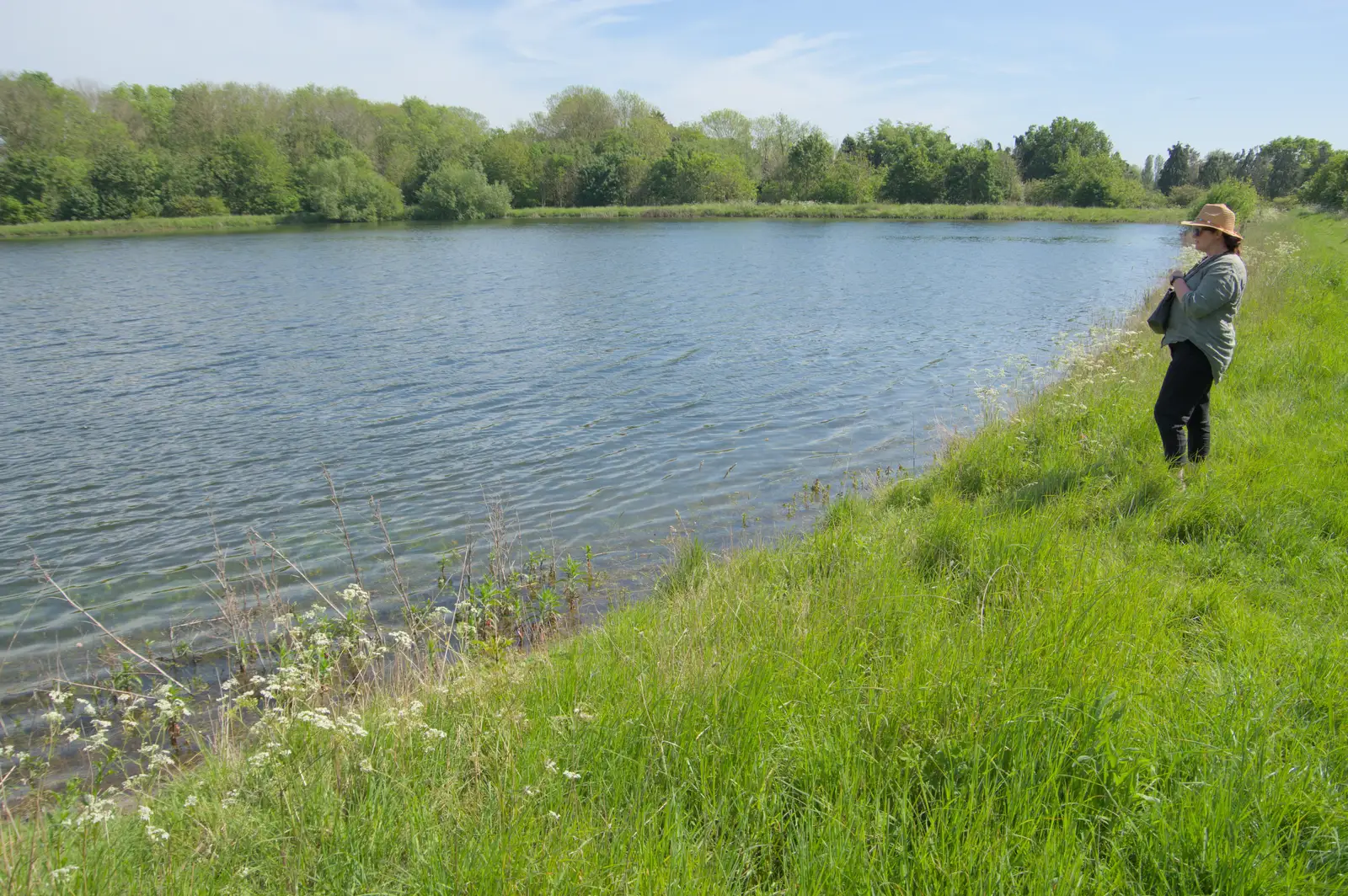 Isobel looks out over the now-full resevoir, from The BSCC at The Half Moon, Rushall, Norfolk - 16th May 2024