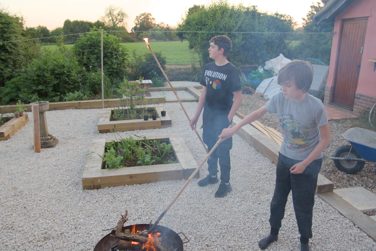 The boys have fun with burning sticks, from The Village Hall Plant Sale, and a New Dinghy, Weybread, Norfolk - 19th May 2024