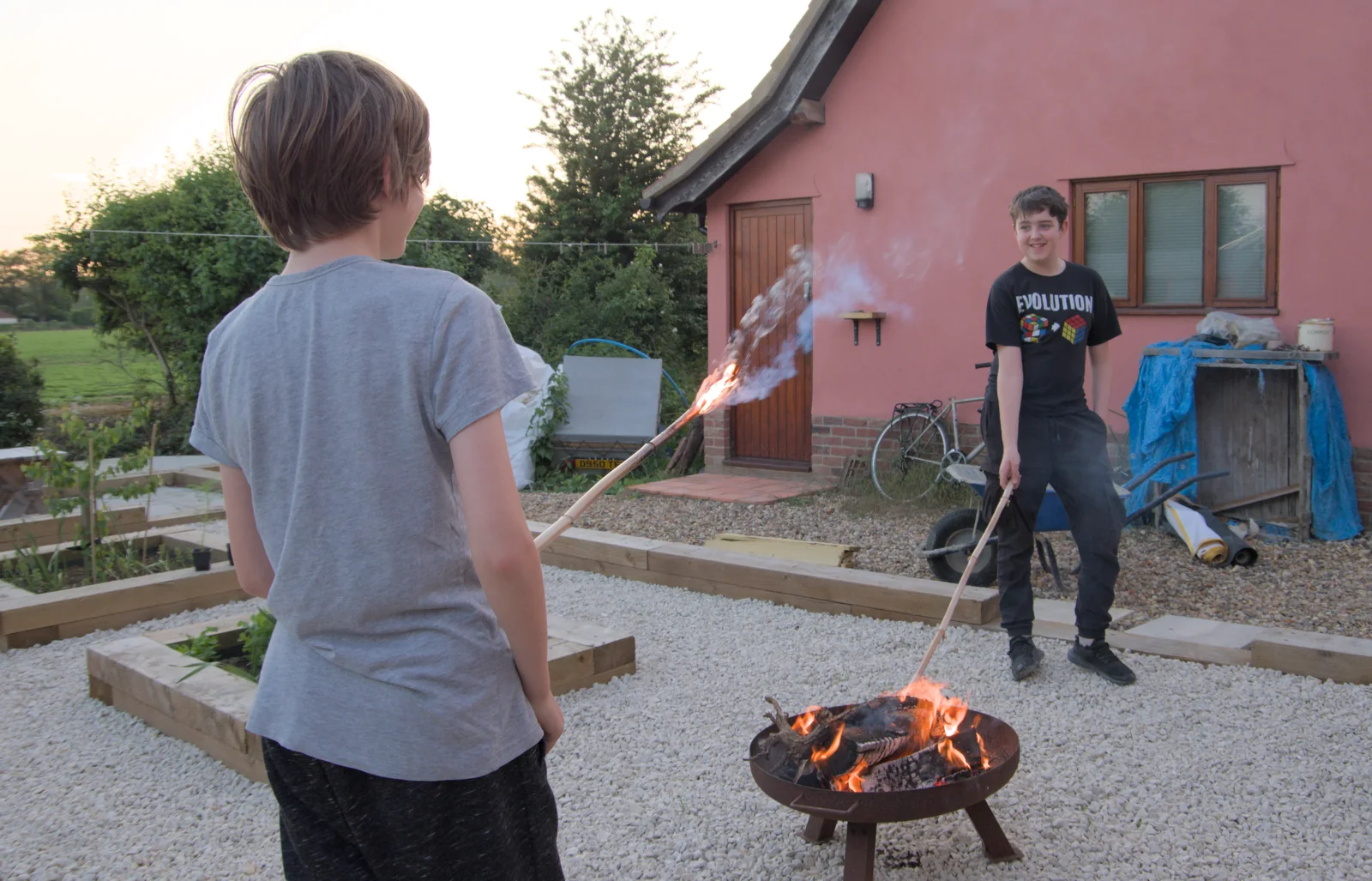 Harry's got a good flame on his stick, from The Village Hall Plant Sale, and a New Dinghy, Weybread, Norfolk - 19th May 2024