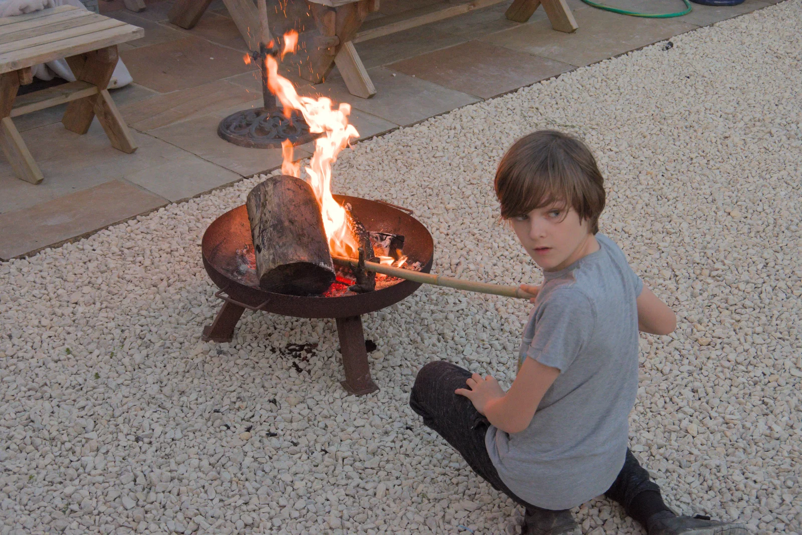 Harry returns to the fire pit for a top up, from The Village Hall Plant Sale, and a New Dinghy, Weybread, Norfolk - 19th May 2024