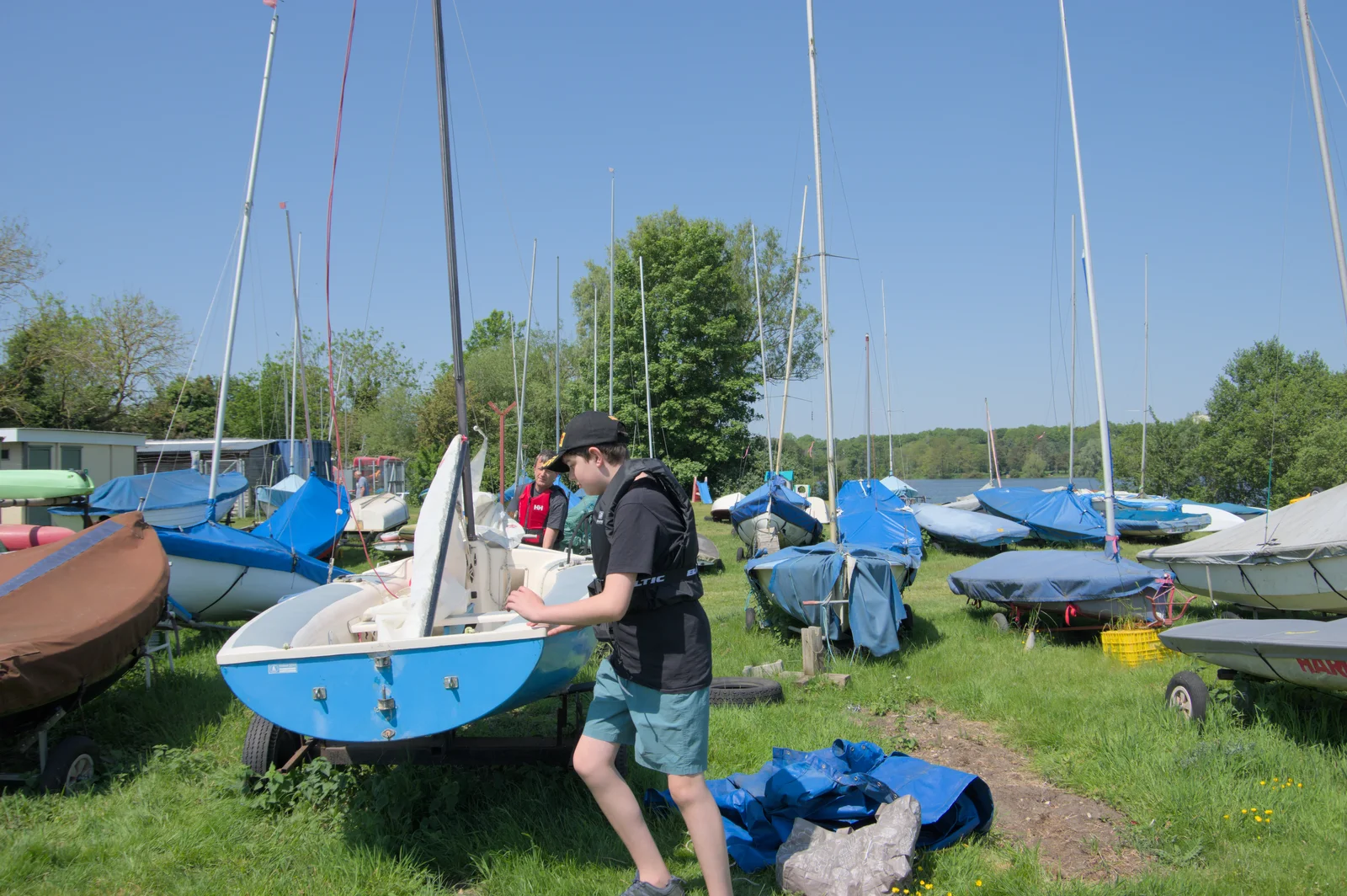 Fred helps to rig up the new birthday dinghy, from The Village Hall Plant Sale, and a New Dinghy, Weybread, Norfolk - 19th May 2024