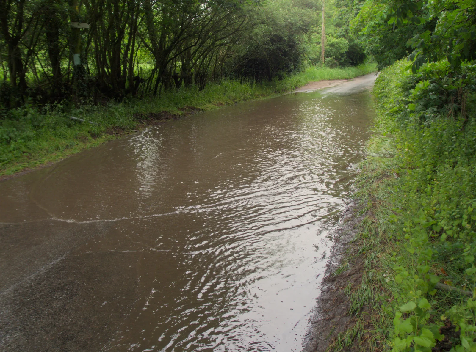 The road through Thornham Magna is flooded, from A Trip to Beccles, and the BSCC at The Greyhound, Botesdale, Suffolk - 23rd May 2024